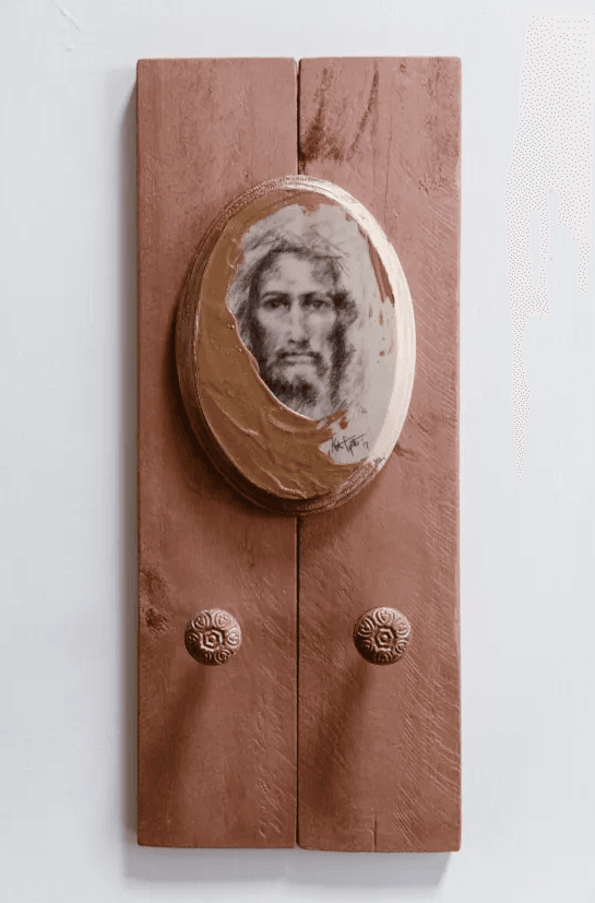 Photo of a Rosary Hanger created by Kate Capato (Visual Grace).  This Rosary hanger feature's Kate's original artwork - a sketch of the Face of Jesus