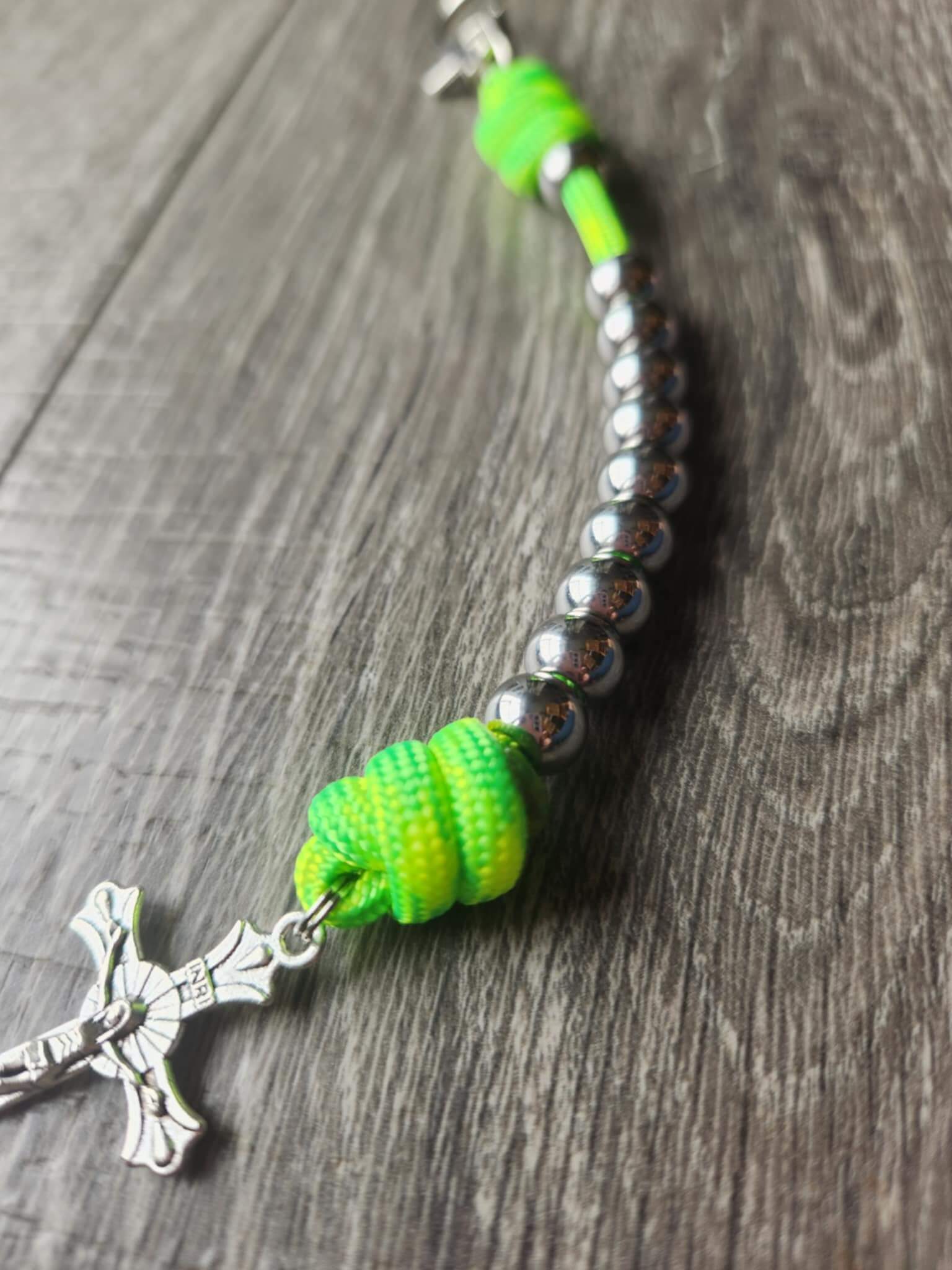 Fidget Rosary from Kolbe & Co. Silver beads and green rope
