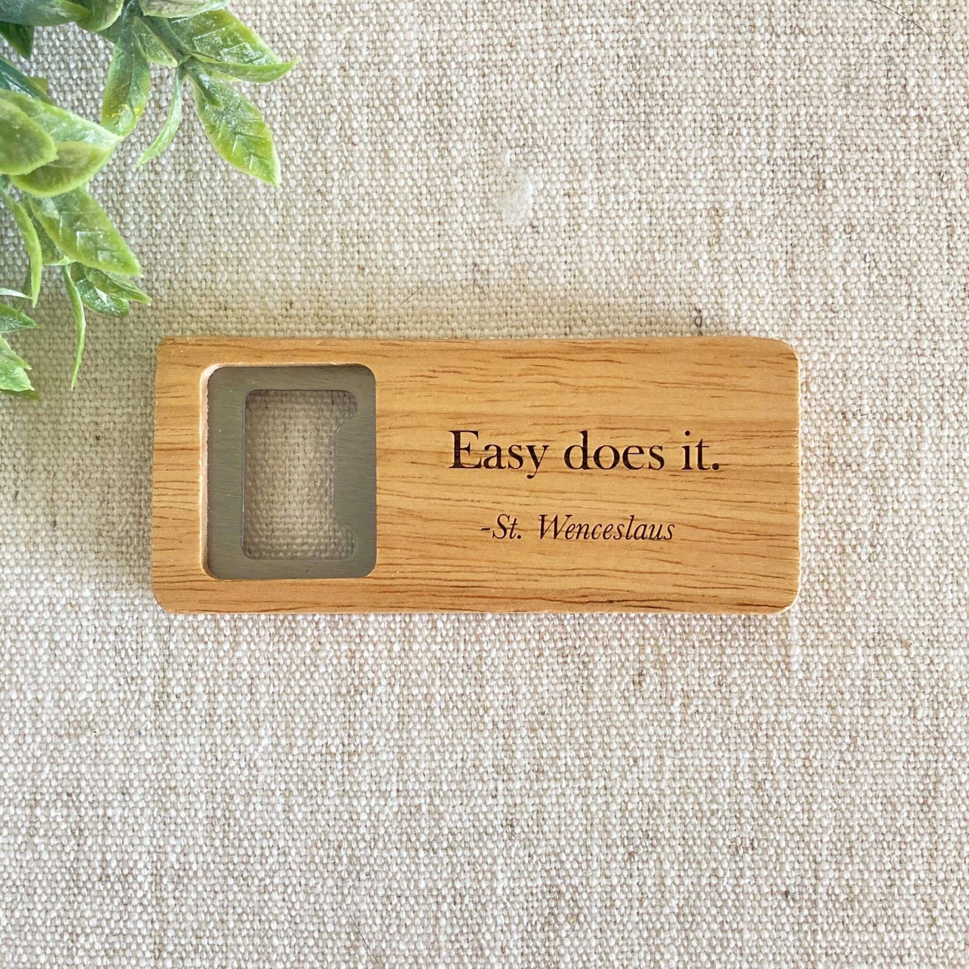 Wooden bottle opener that says Easy does it.  - St. Wenceslaus